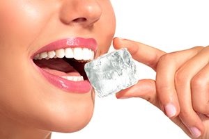 Woman Biting an Ice Cube